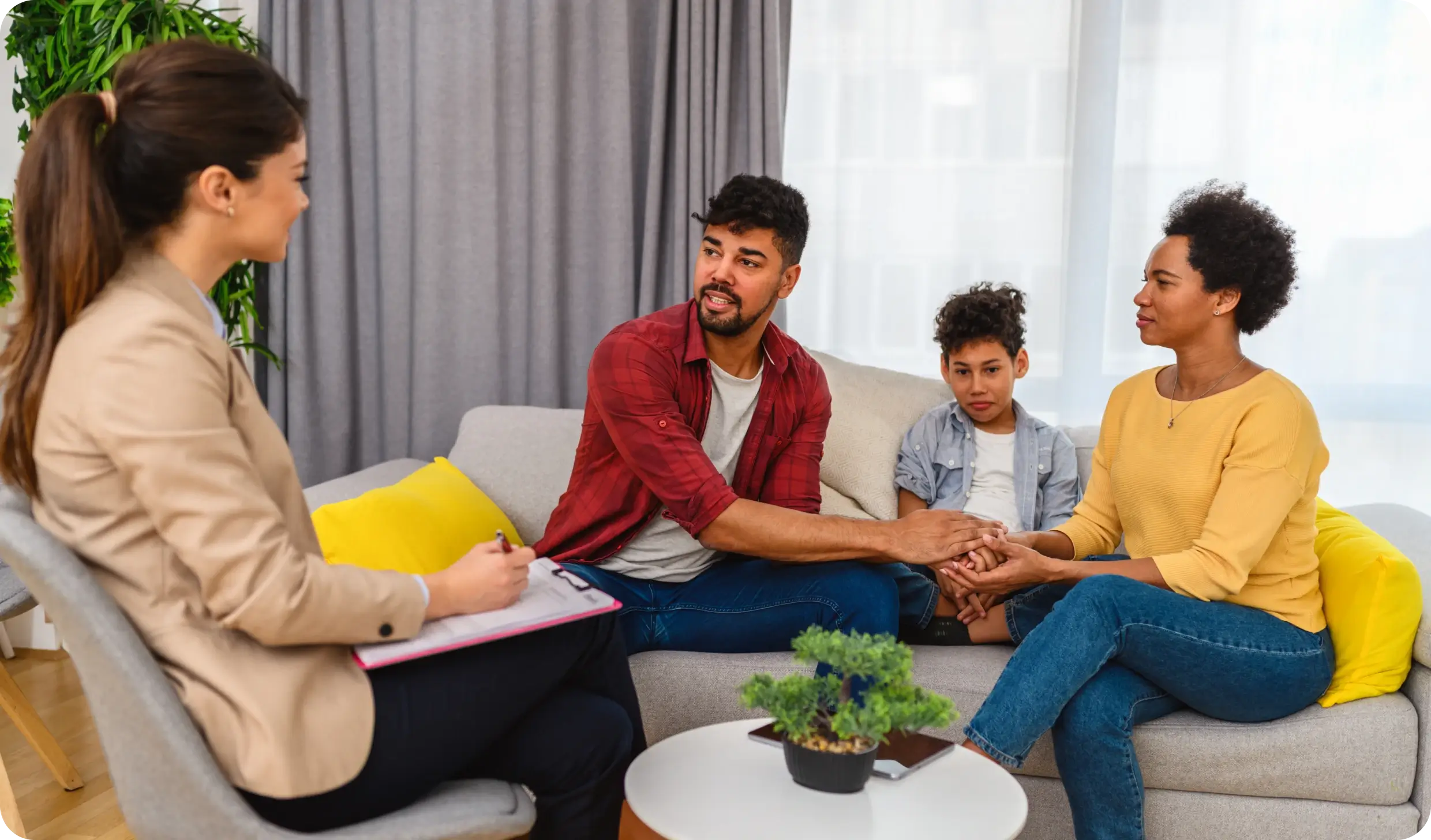 Family counseling session on a sofa