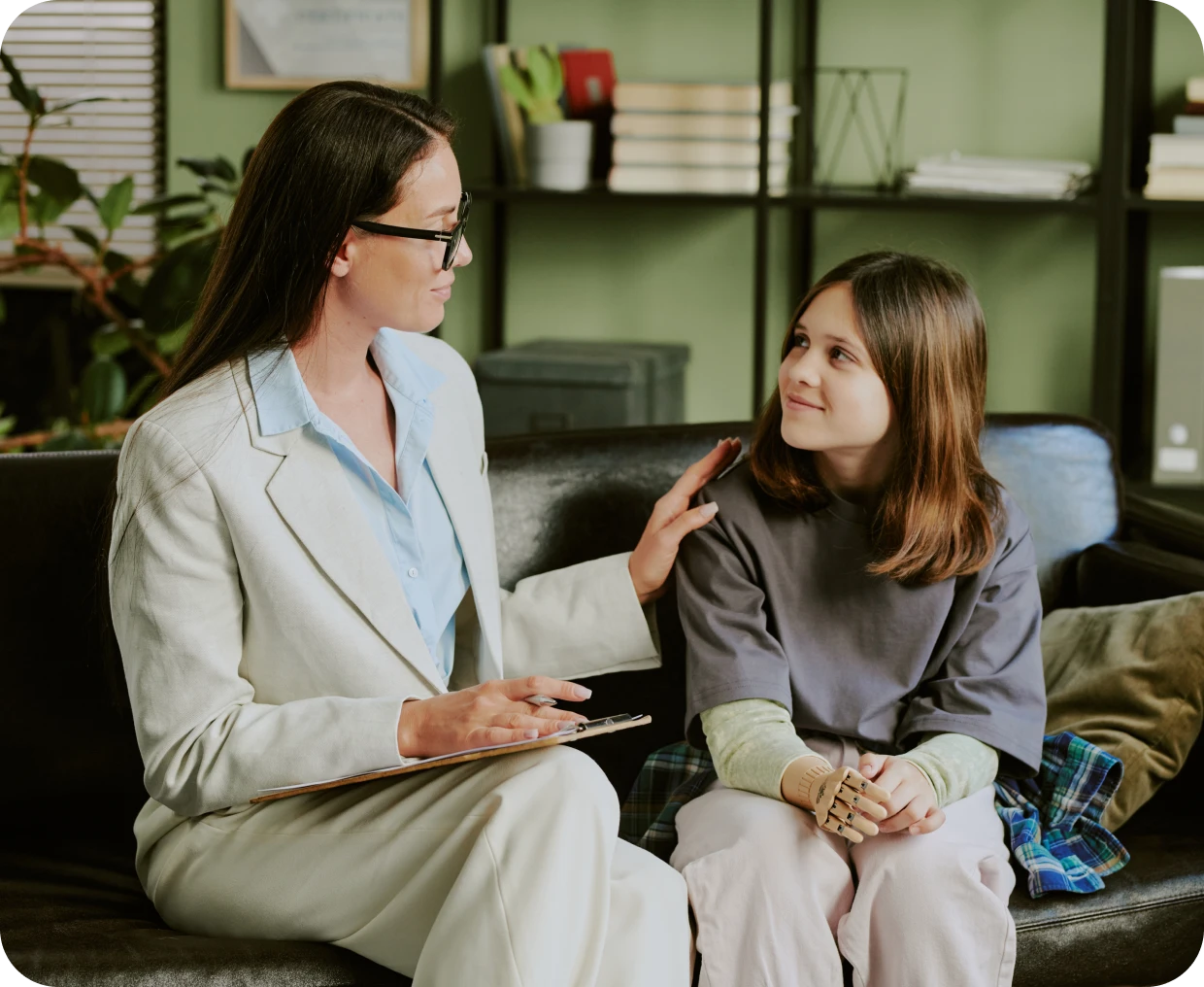 Counselor talking with a child